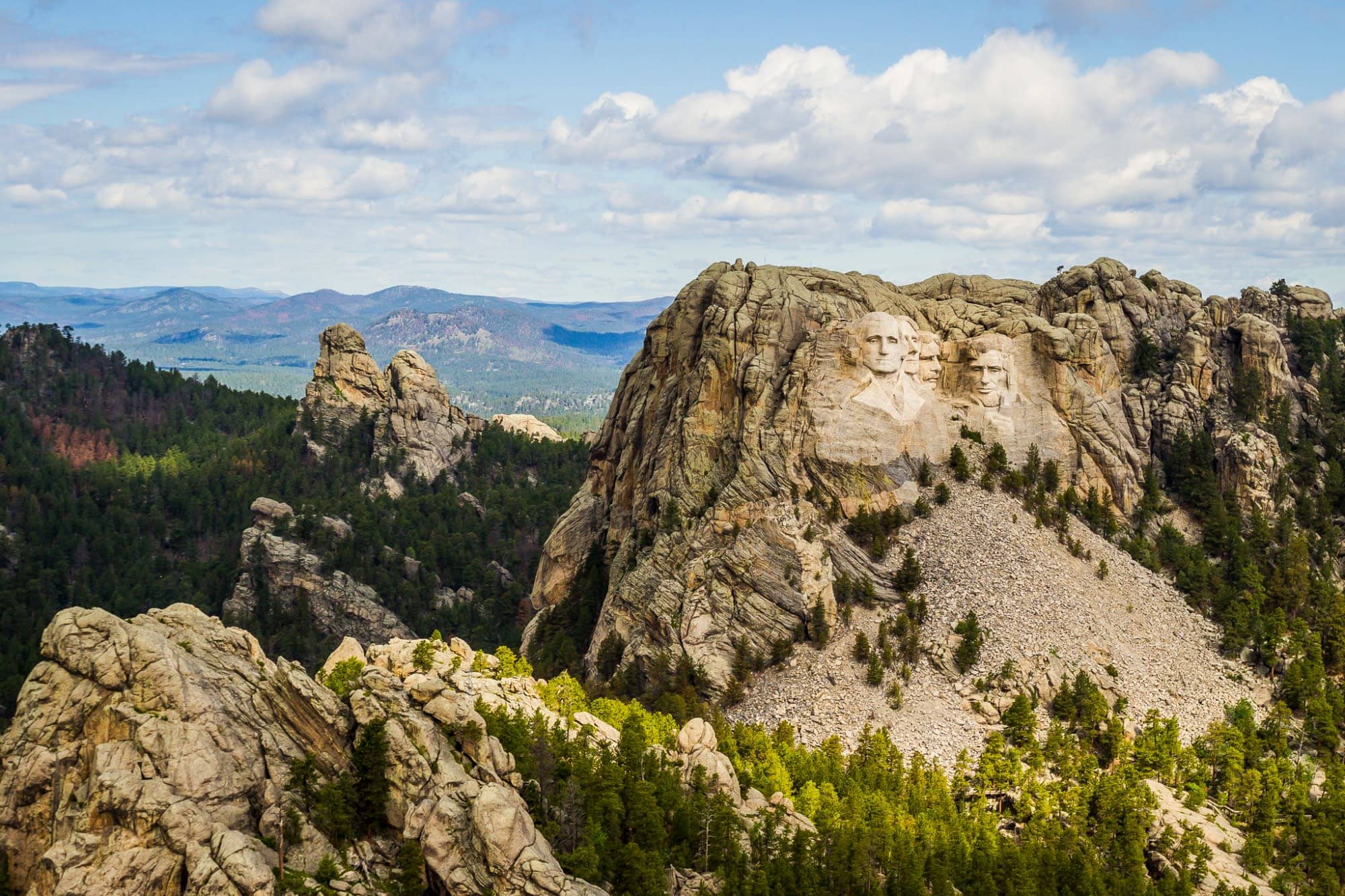 The faces of how many Presidents are carved into Mount Rushmore ...